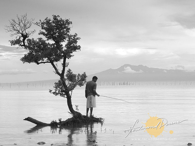 Sandugan Beach Man and mangrove